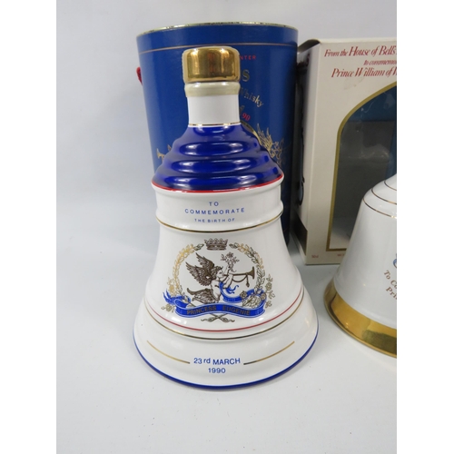 598 - Two Full Commemorative Royal Bells whiskey decanters. (One has cellophane seal one does not)with tin... 