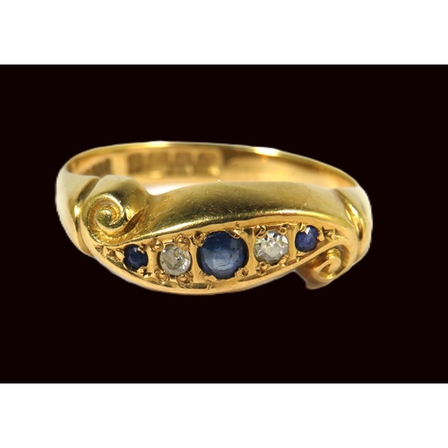 507A - 18ct Yellow Gold Ring Set with Three Sapphires and Two Diamonds.  Finger size 'P-5'   3.7g ..Hallmar... 