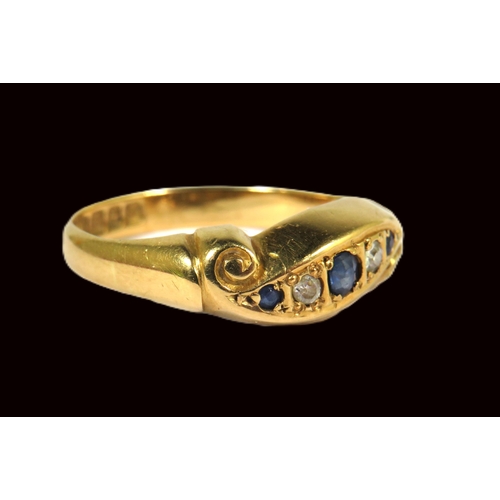 507A - 18ct Yellow Gold Ring Set with Three Sapphires and Two Diamonds.  Finger size 'P-5'   3.7g ..Hallmar... 