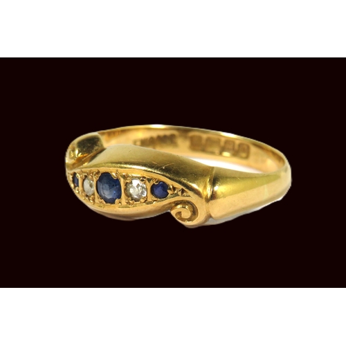 507A - 18ct Yellow Gold Ring Set with Three Sapphires and Two Diamonds.  Finger size 'P-5'   3.7g ..Hallmar... 