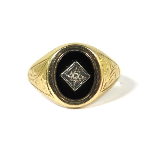 511A - 9ct Yellow Gold Signet Ring set with a central Oval Onyx with Diamond to centre.  Finger size  N  3.... 