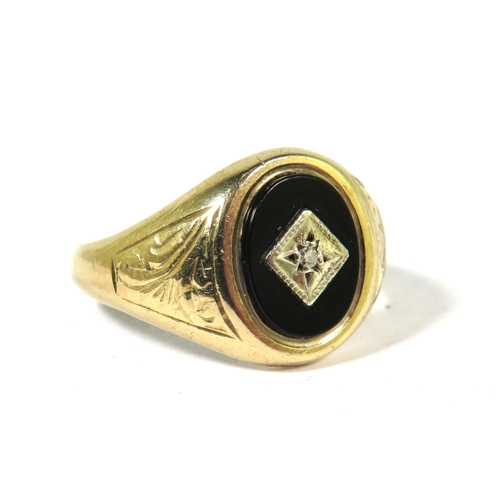 511A - 9ct Yellow Gold Signet Ring set with a central Oval Onyx with Diamond to centre.  Finger size  N  3.... 