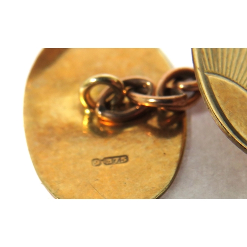 520A - Pair of Fine 9ct Yellow Gold Cufflinks with etched sunrise decoration. Gold chain link to each.  Tot... 