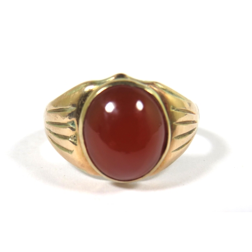 537A - 9ct Yellow Gold Signet Ring set with a large Cornelian Cabouchon which measures approx 12 x 10mm.   ... 