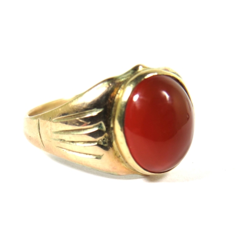 537A - 9ct Yellow Gold Signet Ring set with a large Cornelian Cabouchon which measures approx 12 x 10mm.   ... 