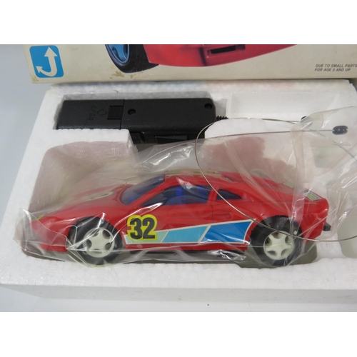 805 - THIS LOT HAS NOW BEEN WITHDRAWN BY THE VENDOR.
Two Vintage Radio Controlled cars FERRARI 288 GTO & P... 