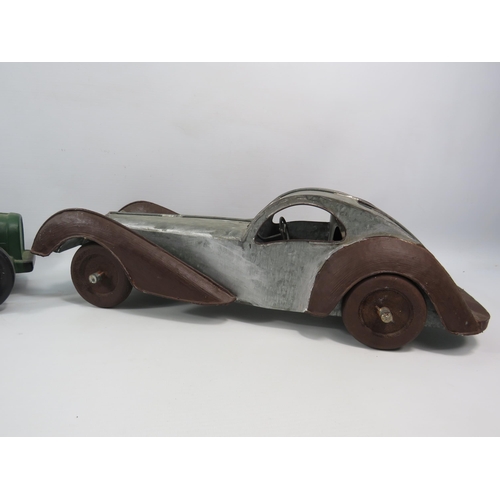 807 - THIS LOT HAS NOW BEEN WITHDRAWN BY THE VENDOR.
Large tin model car plus a ceramic model car with dri... 