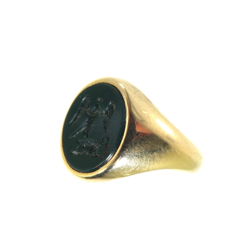 335A - 9ct Yellow Gold Signet ring set with a Bloodstone Seal. Finger size M  6.3g