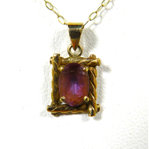 338A - Small Amethyst set 9ct Pendant set on a 15 inch 9ct yellow gold chain. Total weight 1.0g