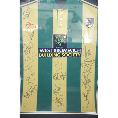 780 - Framed WBA Football Shirt with Team Signatures.. Frame size 40 x 44 inches. See photos.