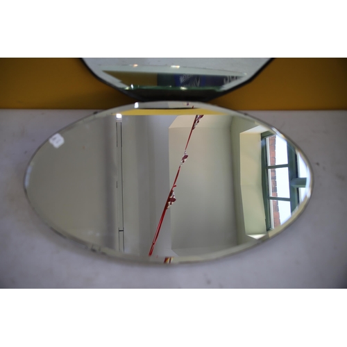 796 - Two Vintage Frameless mirrors. Each measures approx 15 x 26 inches. See photos.