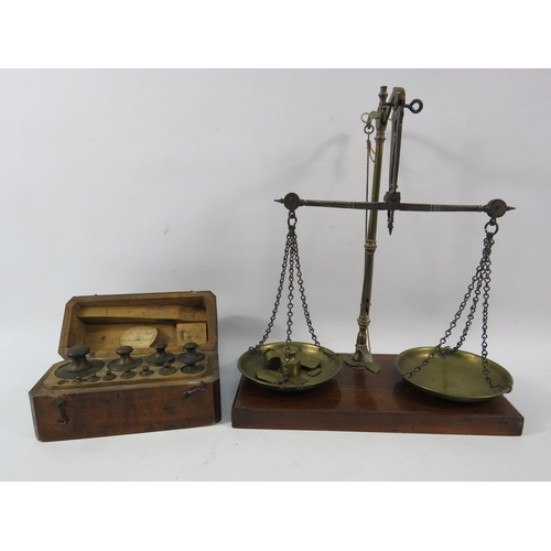 112a - Small set of vintage brass scales by W&T Avery plus a set of dutch brass weights in wooden case.