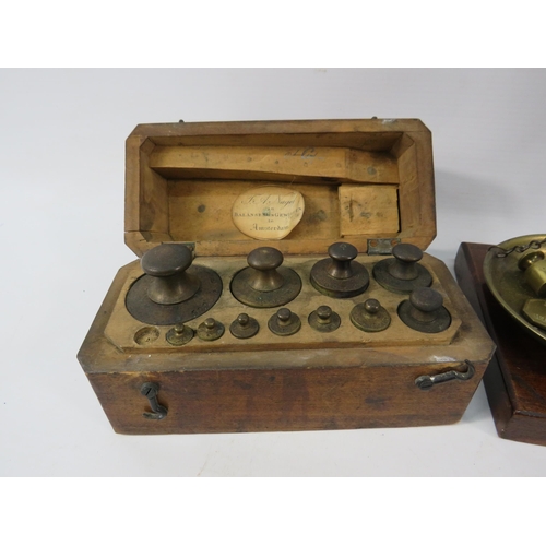 112a - Small set of vintage brass scales by W&T Avery plus a set of dutch brass weights in wooden case.