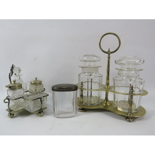 185a - Vintage pickle jars set in white metal stand, cruet set and a lidded glass jar.