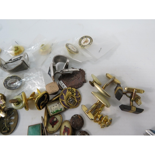 327a - Selection of Cufflinks, tie pins and pin badges.