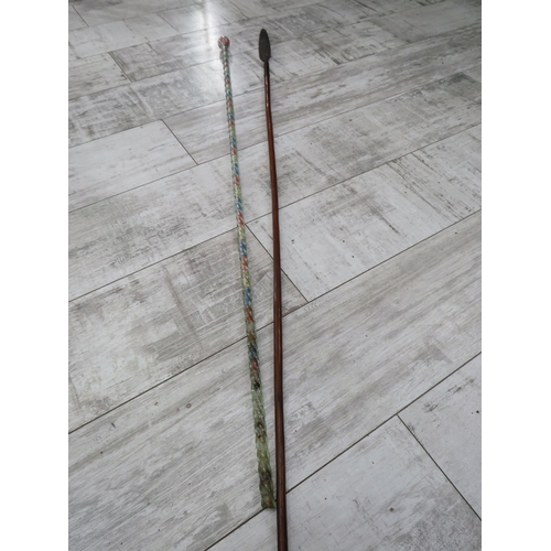 72a - Vintage tribal spear and a glass walking cane, the longest measures 55.5