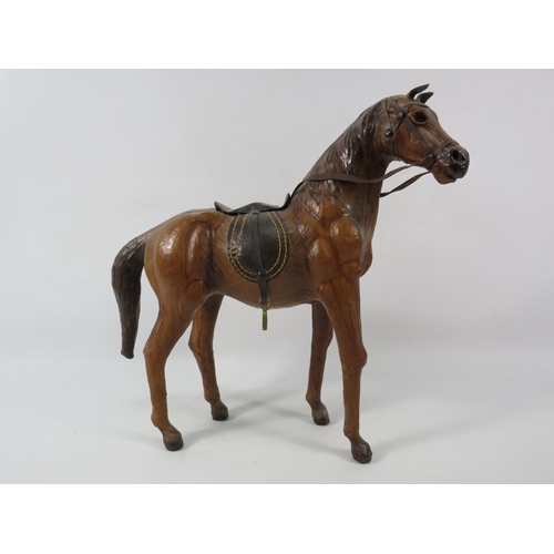 79a - Vintage leather horse figure, 13