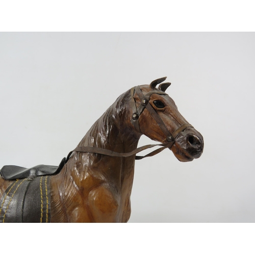 79a - Vintage leather horse figure, 13