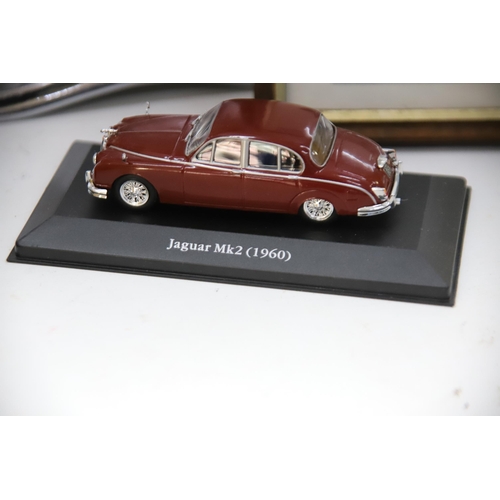 873 - THIS LOT HAS NOW BEEN WITHDRAWN BY THE VENDOR.
Nice Selection of Jaguar Car relaed items.  See photo... 