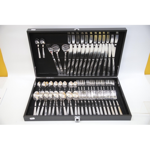 877 - Near complete set (70+ Pieces)  of Stainless Steel Cutlery with case.  See photos.