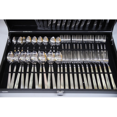 877 - Near complete set (70+ Pieces)  of Stainless Steel Cutlery with case.  See photos.