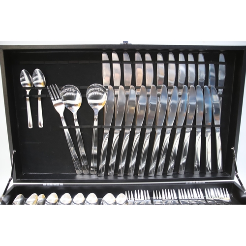 877 - Near complete set (70+ Pieces)  of Stainless Steel Cutlery with case.  See photos.