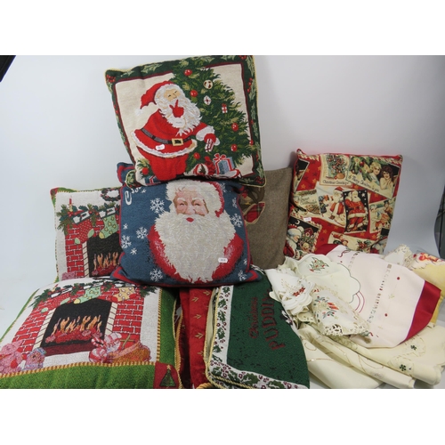 1092 - 8 x Christmas cushions, 5 x cushion covers, Table cloths, napkins, tea towels etc.