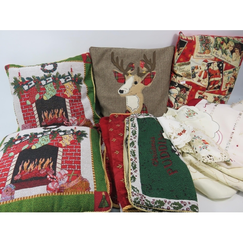 1092 - 8 x Christmas cushions, 5 x cushion covers, Table cloths, napkins, tea towels etc.