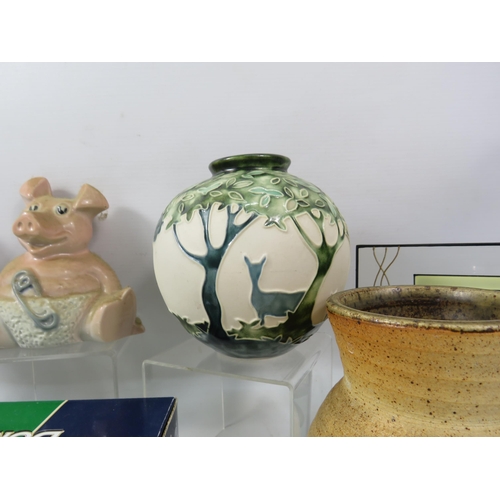 1099 - Mixed lot to include Studio pottery, Wade pig banks, and cat figurines including one by Coalport. Et... 