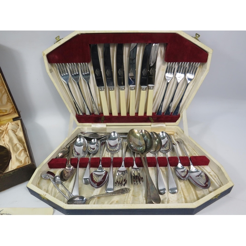 1108 - 1950s Cutlery set and dressing table grooming set.