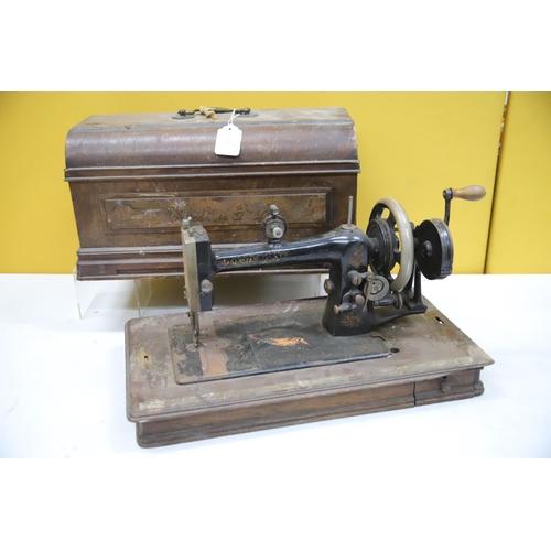 939 - THIS LOT HAS NOW BEEN WITHDRAWN BY THE VENDOR.
Antique Sewing Machine with original wooden Case. Mak... 