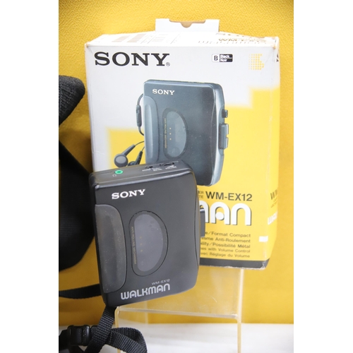 943 - Mixed Lot to include a Sony Walkman WM ex12 with Box plus a Minolta 35mm SLR Camera with lens and ba... 