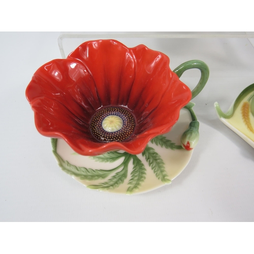 23 - Three Franz Porcelain cups and saucers, Poppy, Dragonfly and Bee patterns.