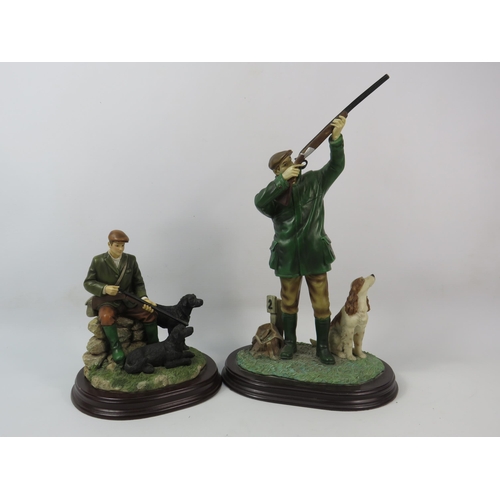 36 - Two Leonardo resin hunting / shooting and working dog figurines the tallest stands 13