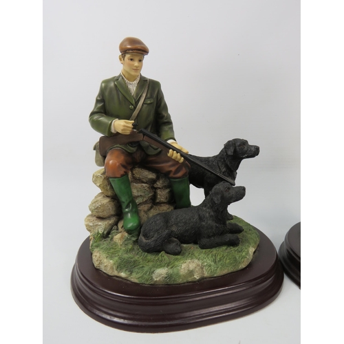 36 - Two Leonardo resin hunting / shooting and working dog figurines the tallest stands 13