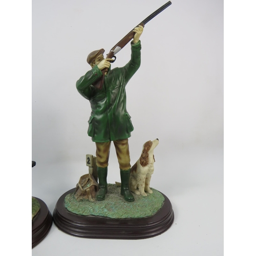 36 - Two Leonardo resin hunting / shooting and working dog figurines the tallest stands 13