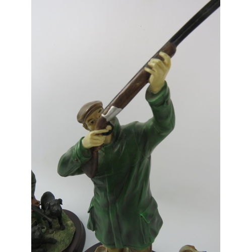 36 - Two Leonardo resin hunting / shooting and working dog figurines the tallest stands 13