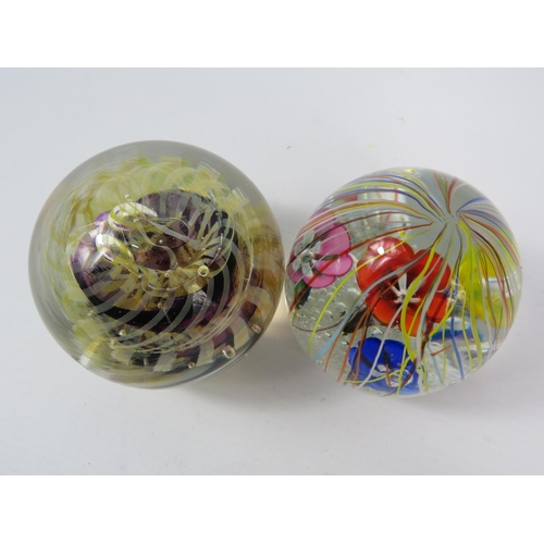 44 - Two Art glass paperweights one by Rollin Karg and one by Murano.