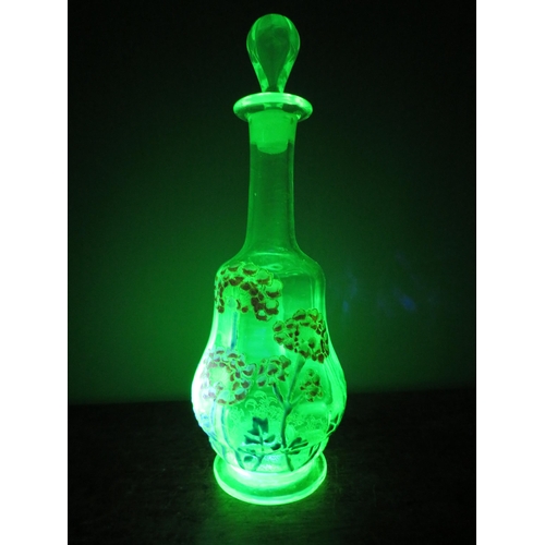 56 - Victorian Uranium glass decanter with handpainted enamel flower decoration, 10.5