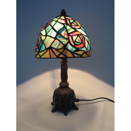 71 - Vintage Tiffany style lamp with bronze effect metal stand set with green stones, 13