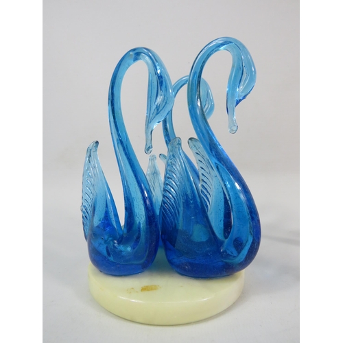 100 - Two sets of Murano art glass swans, one urainium set on a marble base and one orange and white speck... 