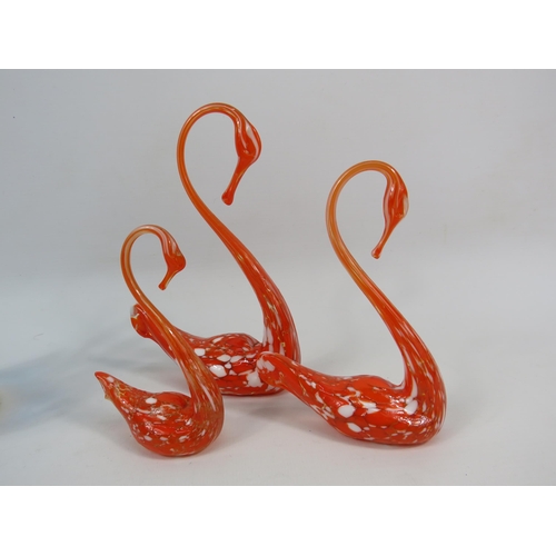 100 - Two sets of Murano art glass swans, one urainium set on a marble base and one orange and white speck... 