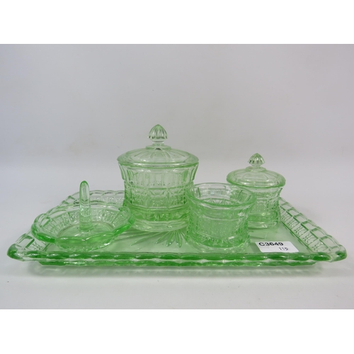 115 - Art Deco uranium glass dressing table set, the tray measures 12 1/4