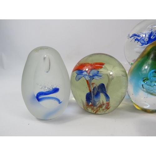 119 - Ten Art glass paperweights, the largest stands 3 3/4