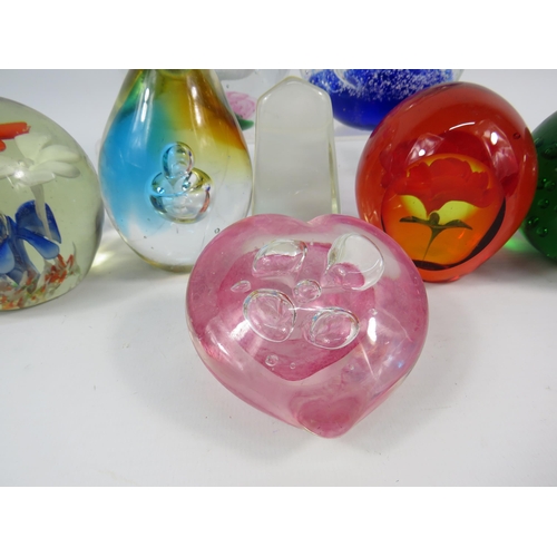 119 - Ten Art glass paperweights, the largest stands 3 3/4