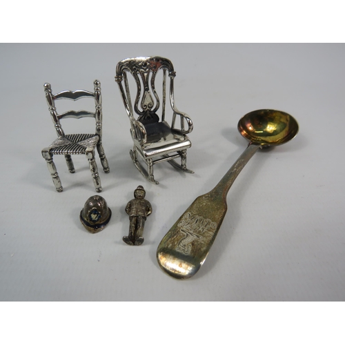 131 - Two 925 sterling silver novelty miniature chairs, a Georgian silver condiment spoon and two charms i... 