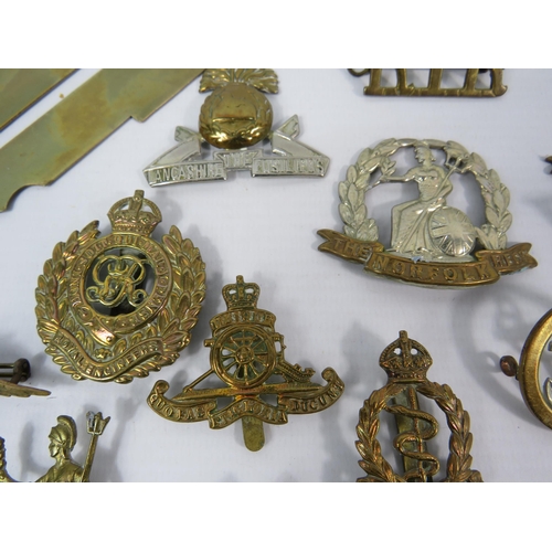 132 - Selection of WW1 and WW2 Military cap badges Button guard and Belt buckle etc.