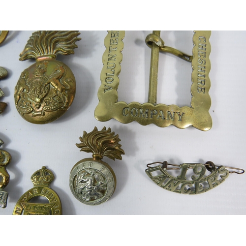 132 - Selection of WW1 and WW2 Military cap badges Button guard and Belt buckle etc.