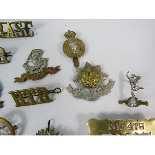 132 - Selection of WW1 and WW2 Military cap badges Button guard and Belt buckle etc.