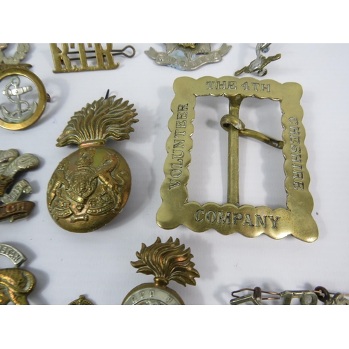 132 - Selection of WW1 and WW2 Military cap badges Button guard and Belt buckle etc.